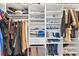 Organized walk-in closet with shelving, hanging racks, and ample space for storage at 610 Mosquito St, Elizabeth, CO 80107