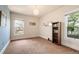 Bedroom with neutral carpet and paint and windows providing lots of natural light at 461 N Marion St, Denver, CO 80218