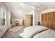 Bedroom featuring natural light, neutral decor, and a faux fur rug at 461 N Marion St, Denver, CO 80218