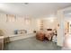 Cozy bedroom featuring carpeted floors, built-in bench seating, and natural light from two windows at 461 N Marion St, Denver, CO 80218