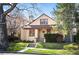 Charming home with a front yard, brick accents, and a welcoming front porch at 461 N Marion St, Denver, CO 80218