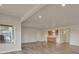 Open basement featuring tile floors, a window, and a kitchenette at 3535 Medallion Rd, Castle Rock, CO 80104