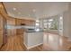 Spacious kitchen with a central island and stainless steel appliances at 3535 Medallion Rd, Castle Rock, CO 80104