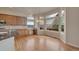 Eat-in kitchen boasts stainless steel appliances, granite countertops and deck access at 3535 Medallion Rd, Castle Rock, CO 80104