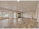 Expansive living room showcasing hardwood floors and natural light from a bay window at 3535 Medallion Rd, Castle Rock, CO 80104