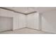 Bright storage room with carpet and a large bank of white cabinets at 3535 Medallion Rd, Castle Rock, CO 80104