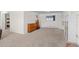 Large basement area provides ample space and new carpet for various activities or storage at 255 Iroquois Dr, Boulder, CO 80303