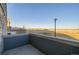 Spacious back patio with distant views at 12713 Leyden St # F, Thornton, CO 80602