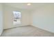 Spacious bedroom with neutral carpeting and a large window at 9749 Steele St, Thornton, CO 80229