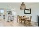 Modern dining area with a light and airy feel, adjacent to kitchen at 9749 Steele St, Thornton, CO 80229