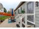 Backyard patio with table, seating, and access to the house via stairs at 20715 Bridlewood Ln, Parker, CO 80138