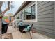 Backyard patio with grill and seating offers a serene outdoor space at 20715 Bridlewood Ln, Parker, CO 80138