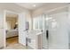 Bathroom showcasing a soaking tub, and a separate tiled shower adjacent to the primary bedroom at 20715 Bridlewood Ln, Parker, CO 80138