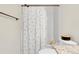 Bathroom featuring a large mirror, granite countertop and shower with polka dot curtain at 16818 E 119Th Ave # A, Commerce City, CO 80022