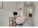 Functional office space featuring a modern desk setup and neutral decor at 16818 E 119Th Ave # A, Commerce City, CO 80022