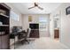 Office or bedroom with ceiling fan, large window, and neutral carpet at 16351 Askins Loop, Parker, CO 80134