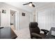 Bedroom with carpet, fan, closet and neutral walls at 16351 Askins Loop, Parker, CO 80134