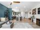 Spacious living room with an open layout, hardwood floors, and contemporary finishes at 16351 Askins Loop, Parker, CO 80134
