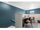 Loft or study with shared desk area, natural light, and modern decor at 16351 Askins Loop, Parker, CO 80134