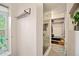 Bright bathroom boasts a glass shower, modern shelf, and window offering natural light at 2773 S Lansing Way, Aurora, CO 80014