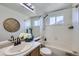 Clean bathroom, shower/tub combo, and vanity at 16424 E 107Th Pl, Commerce City, CO 80022