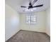 Bright bedroom with window and ceiling fan at 16424 E 107Th Pl, Commerce City, CO 80022