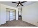 Spacious bedroom with ceiling fan and large closet at 16424 E 107Th Pl, Commerce City, CO 80022