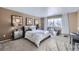 Cozy bedroom with a double bed and neutral decor at 16424 E 107Th Pl, Commerce City, CO 80022