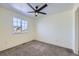 Simple bedroom with grey carpet and ceiling fan at 16424 E 107Th Pl, Commerce City, CO 80022