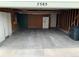 Spacious two car garage with shelving and lots of storage space available at 7565 S Cove Cir, Centennial, CO 80122