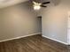 Living room featuring high ceilings, new flooring, and fresh neutral paint at 7565 S Cove Cir, Centennial, CO 80122