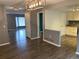 Open-concept living space connecting the kitchen and dining area at 7565 S Cove Cir, Centennial, CO 80122