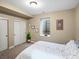 Comfortable bedroom with carpet, natural light, and ample closet space at 810 Jasmine St, Denver, CO 80220