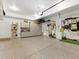 Spacious three car garage with ample storage and epoxy flooring at 810 Jasmine St, Denver, CO 80220