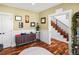 Cozy home office with wood floors, neutral walls and a display of awards at 810 Jasmine St, Denver, CO 80220