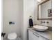 Stylish powder room featuring marble vessel sink, modern fixtures, and elegant design at 810 Jasmine St, Denver, CO 80220