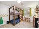 This bedroom has an amazing custom bunk bed made out of rustic wood and features hardwood floors at 1049 Lilac St, Broomfield, CO 80020