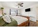 Spacious main bedroom with hardwood floors, ceiling fan and great natural light at 1049 Lilac St, Broomfield, CO 80020