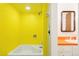 Bathroom with a vanity and bathtub at 7170 W 8Th Pl, Lakewood, CO 80214