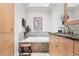 Elegant bathroom featuring a soaking tub, modern fixtures, and stylish tile work, ideal for relaxation at 11 S Albion St, Denver, CO 80246