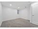 Empty bedroom with neutral carpet, white walls, and a window, ready for personalization and comfort at 11 S Albion St, Denver, CO 80246