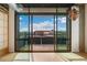 Spacious balcony boasting panoramic city views through large sliding glass doors at 1401 Wewatta St # 709, Denver, CO 80202