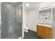 Contemporary bathroom featuring a tiled shower, modern vanity, and sleek fixtures at 1401 Wewatta St # 709, Denver, CO 80202