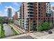 Beautiful brick apartment building with balconies overlooking the street and river at 1401 Wewatta St # 709, Denver, CO 80202