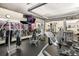 Well-equipped gym featuring modern machines, mirrors, and ample workout space at 1401 Wewatta St # 709, Denver, CO 80202