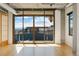 Bright living room with a downtown view, hardwood floors, and ample natural light at 1401 Wewatta St # 709, Denver, CO 80202