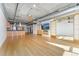 Bright living room with modern lighting and hardwood floors throughout at 1401 Wewatta St # 709, Denver, CO 80202