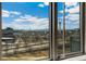 A captivating view of the city skyline, mountains, and parks at 1401 Wewatta St # 709, Denver, CO 80202