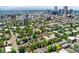 Expansive aerial view showcasing the neighborhood's green landscape and convenient access to city amenities at 1154 N Clarkson St, Denver, CO 80218