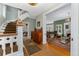 Spacious foyer with views into the living room and dining area, showcasing the home's open layout at 1154 N Clarkson St, Denver, CO 80218